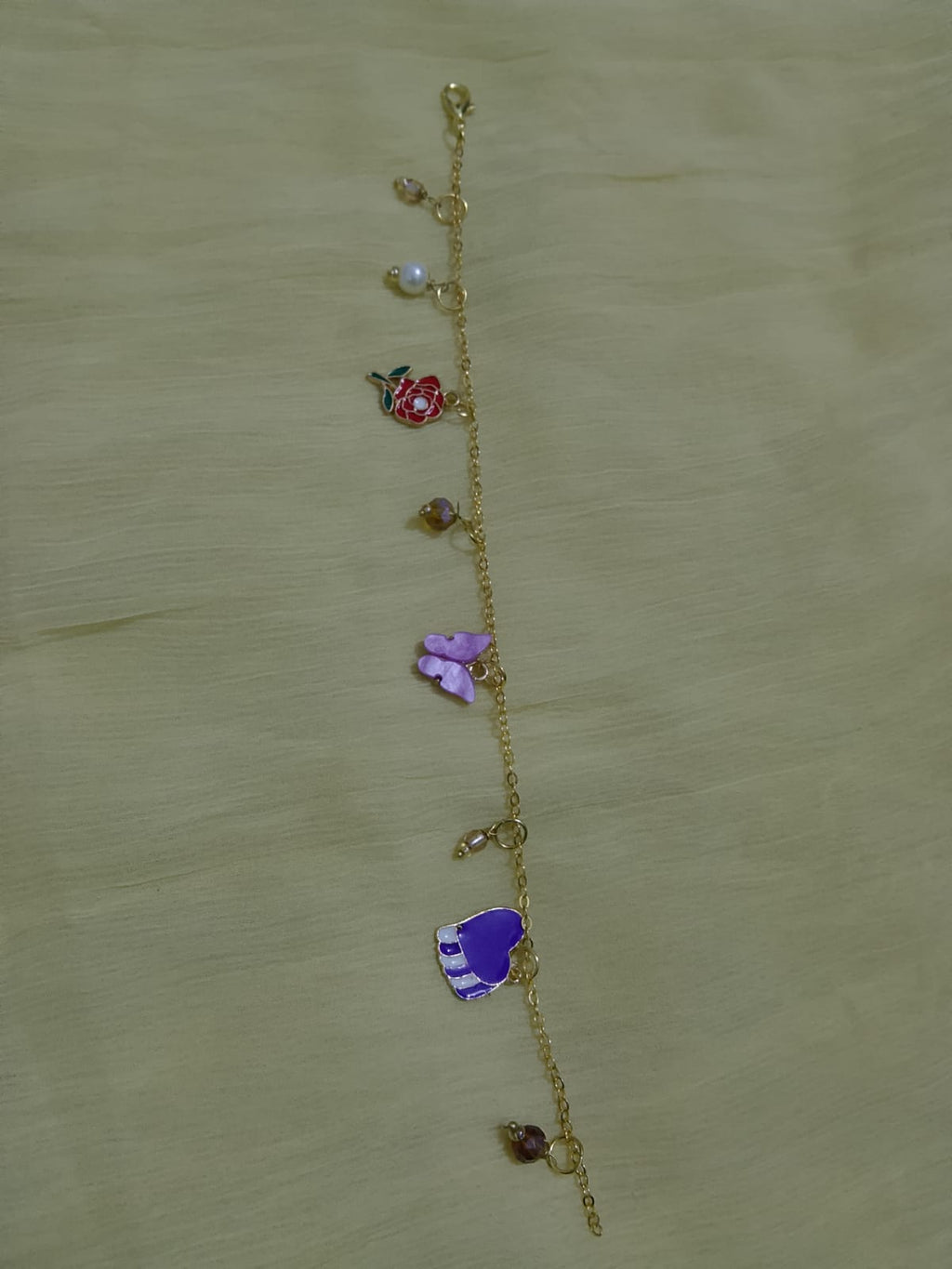 Enchanted Charms Gold Bracelet