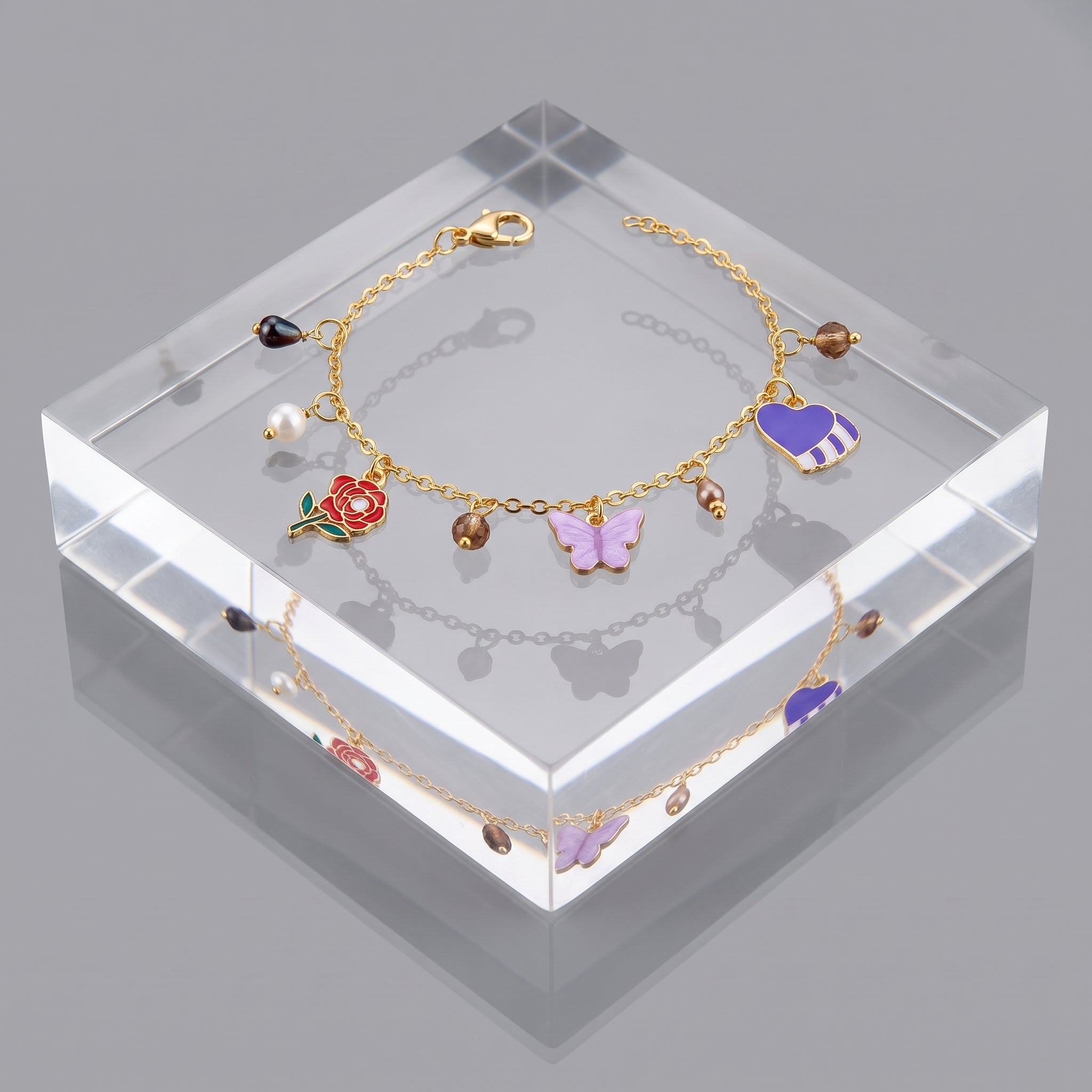 Enchanted Charms Gold Bracelet