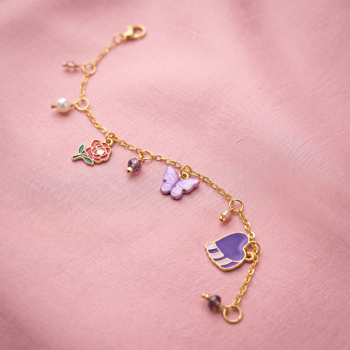 Enchanted Charms Gold Bracelet