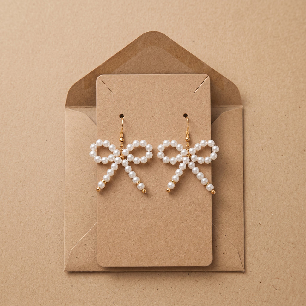 Pearl Bow Dangle Earrings