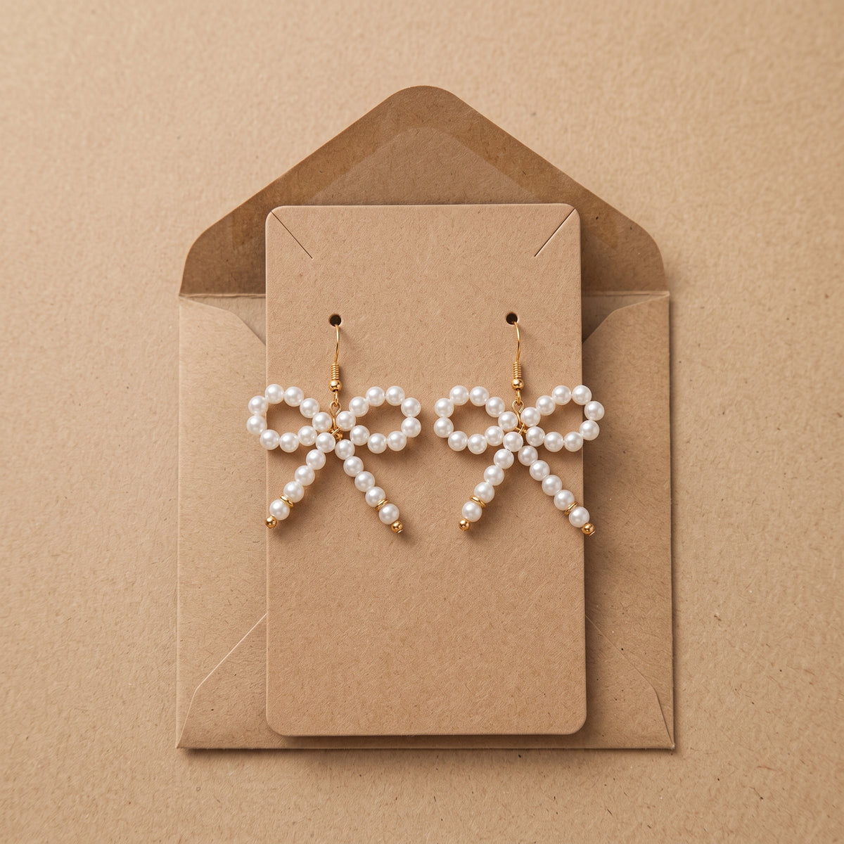 Pearl Bow Dangle Earrings